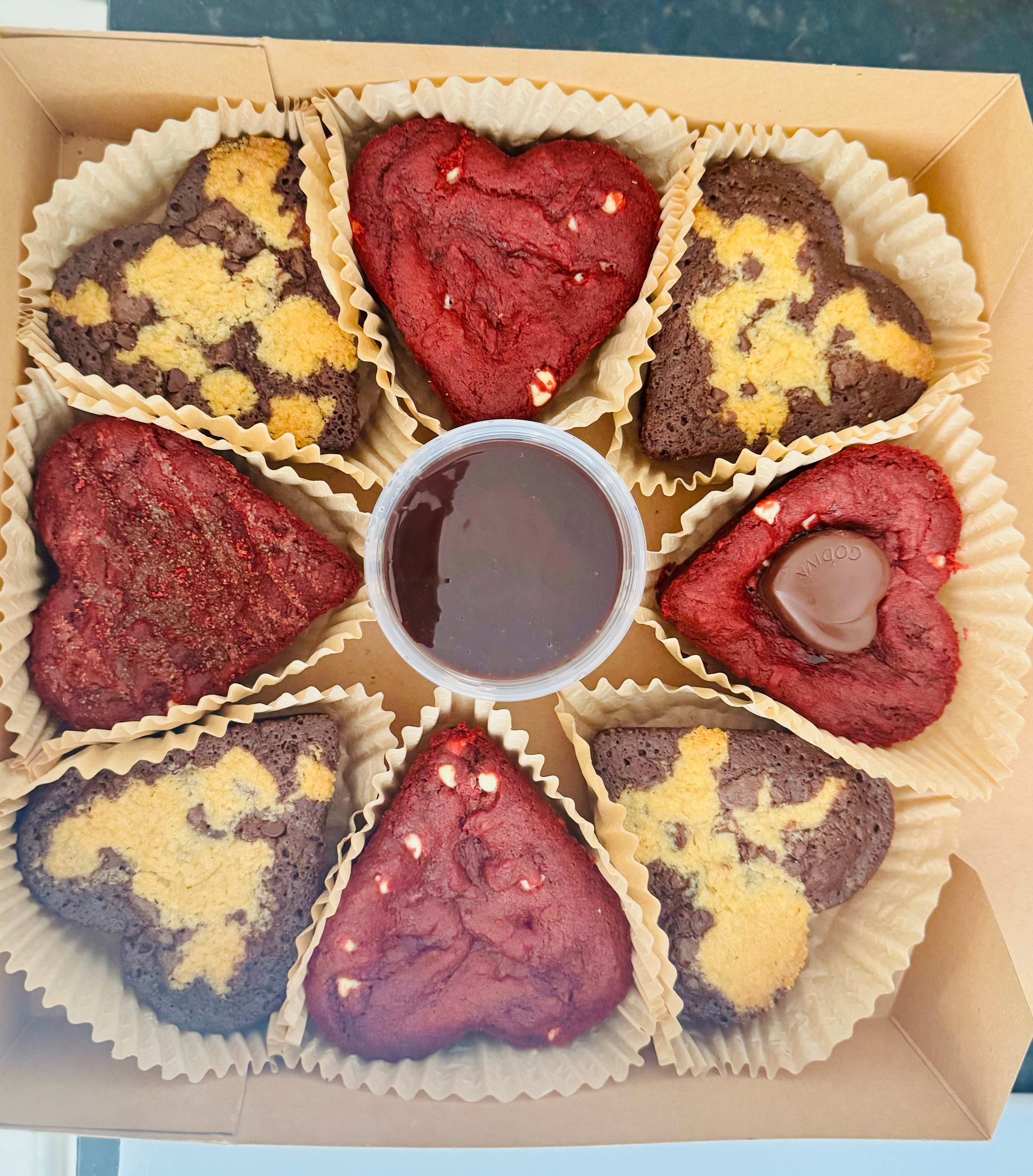 8 Heart shaped brownies with caramel sauce